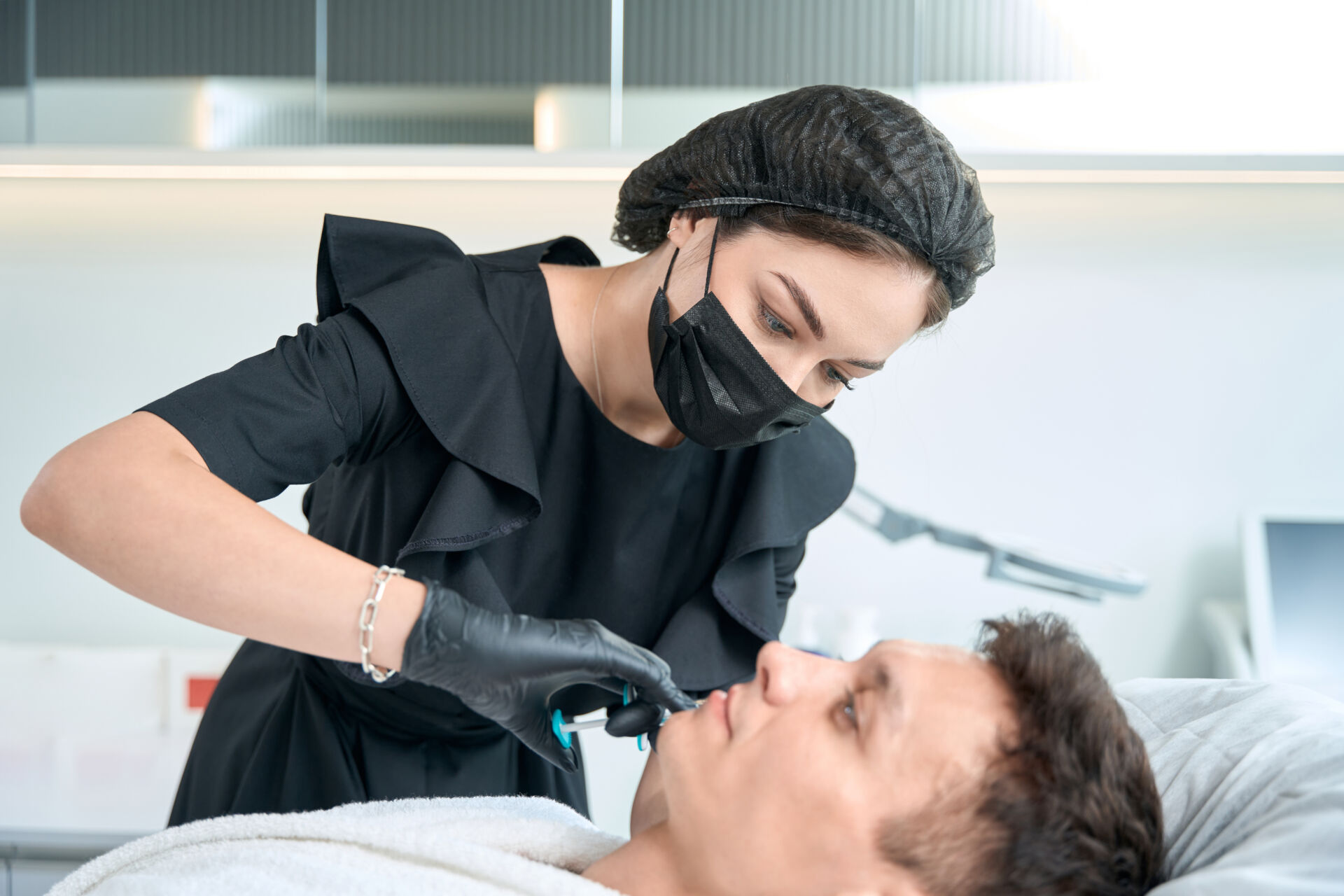 Cosmetic treatment man getting beauty injections procedure. Image for cosmetic treatment prices page